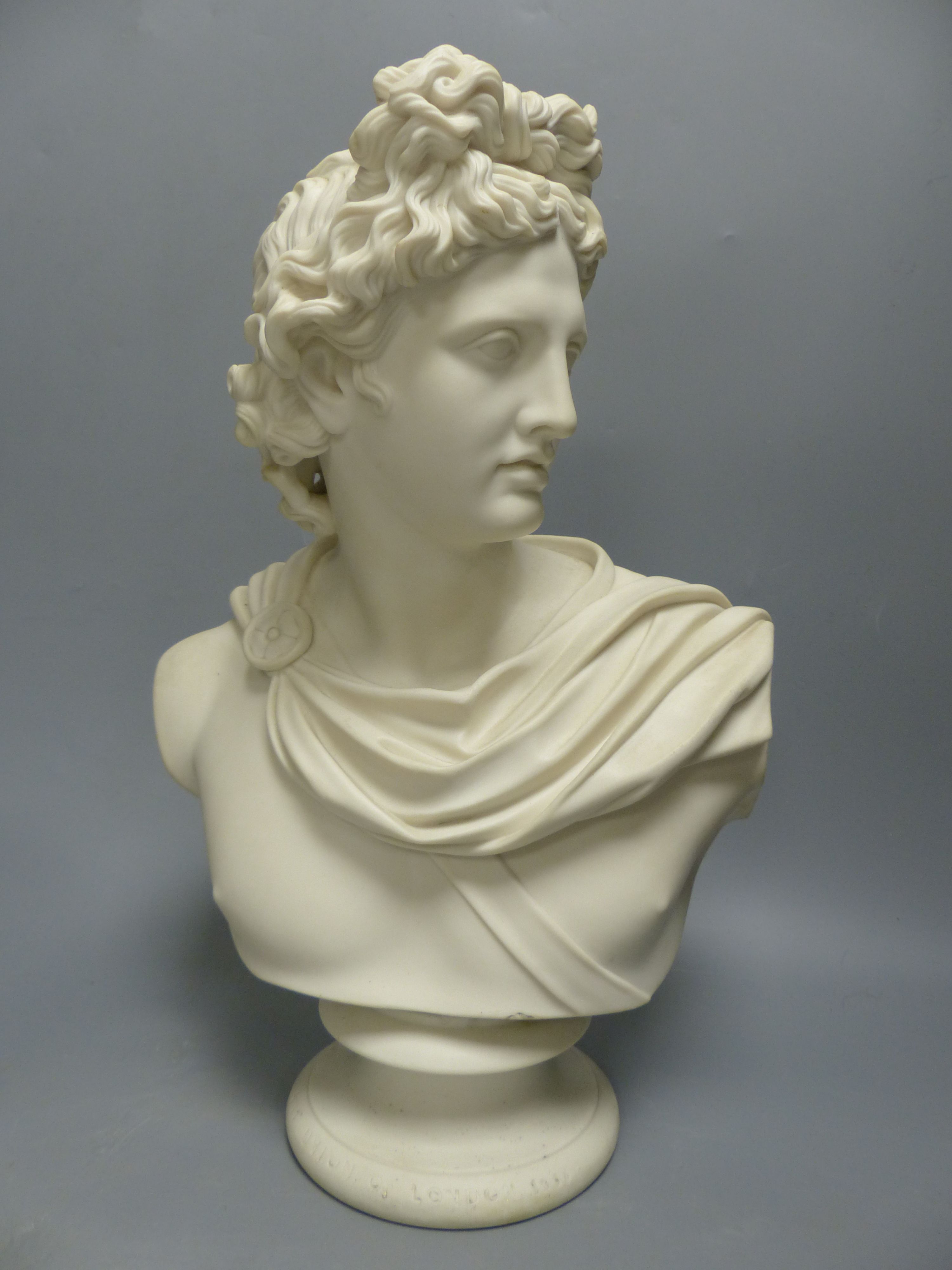 A Brown Westhead and Moore parian bust of Apollo, height 36cm, together with a plaster wall bracket